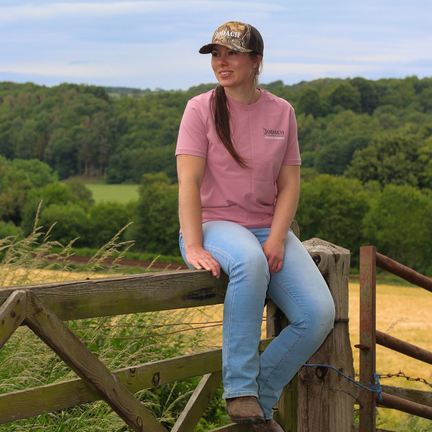 cowgirl tshirt and camo trucker cap