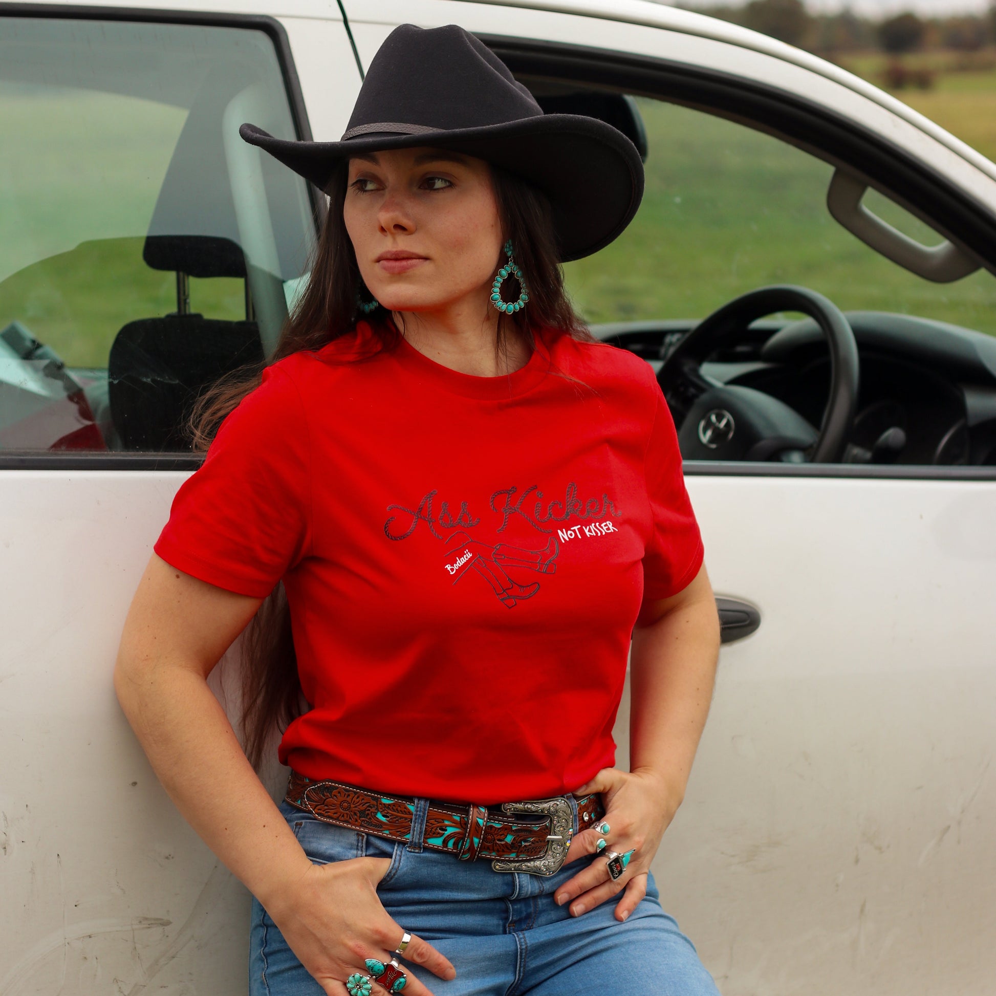 bold strong cowgirl , red western shirt