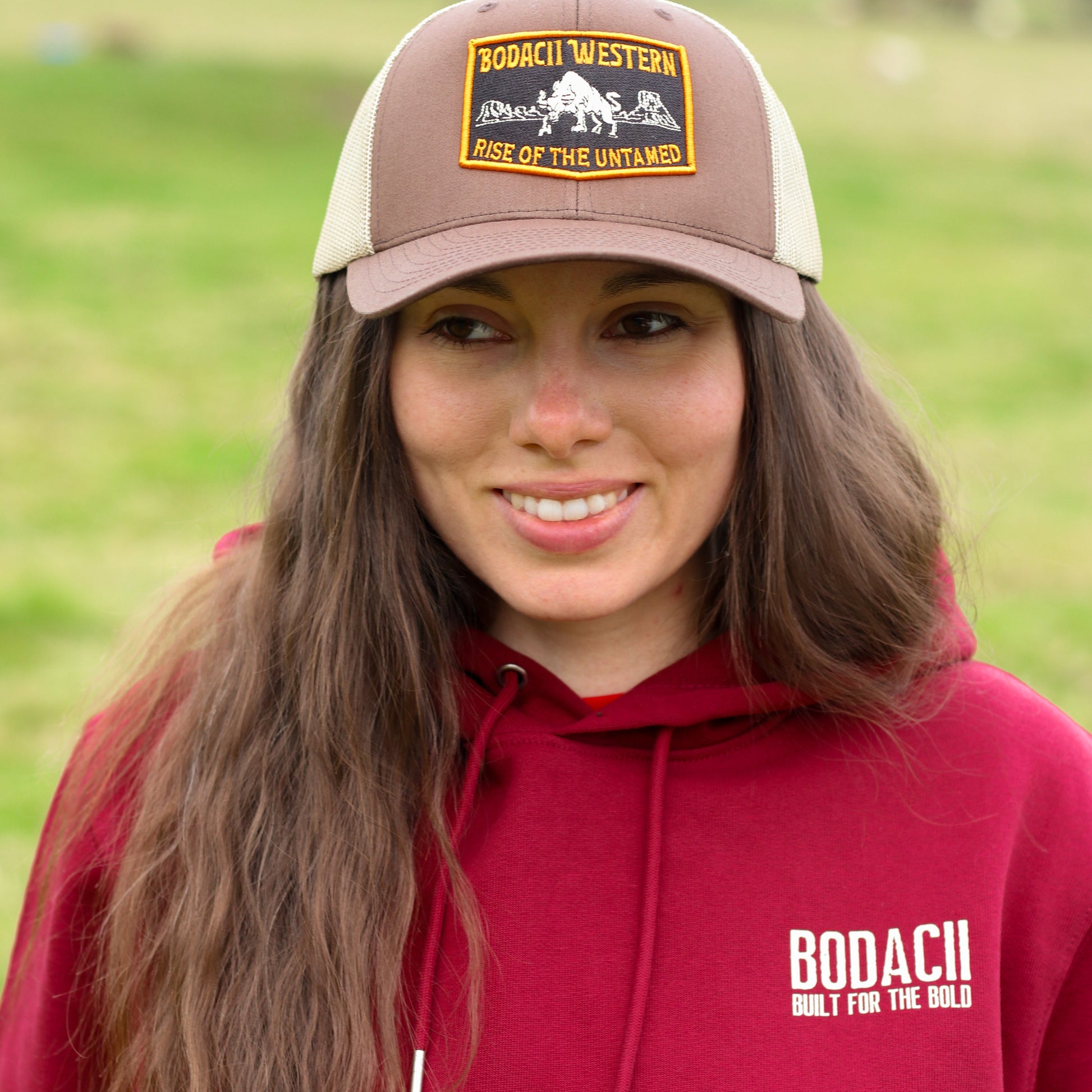 cowgirl hoodie and trucker cap