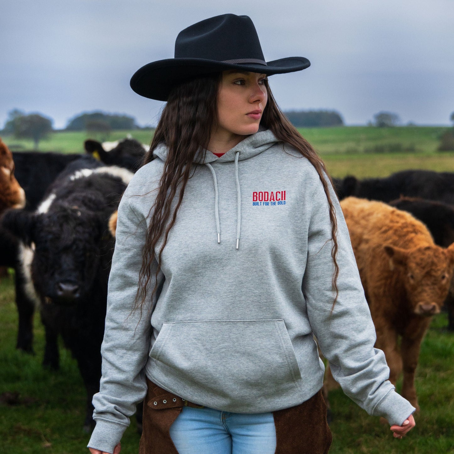 cowgirl cattle ranch wearing barrel racing hoodie